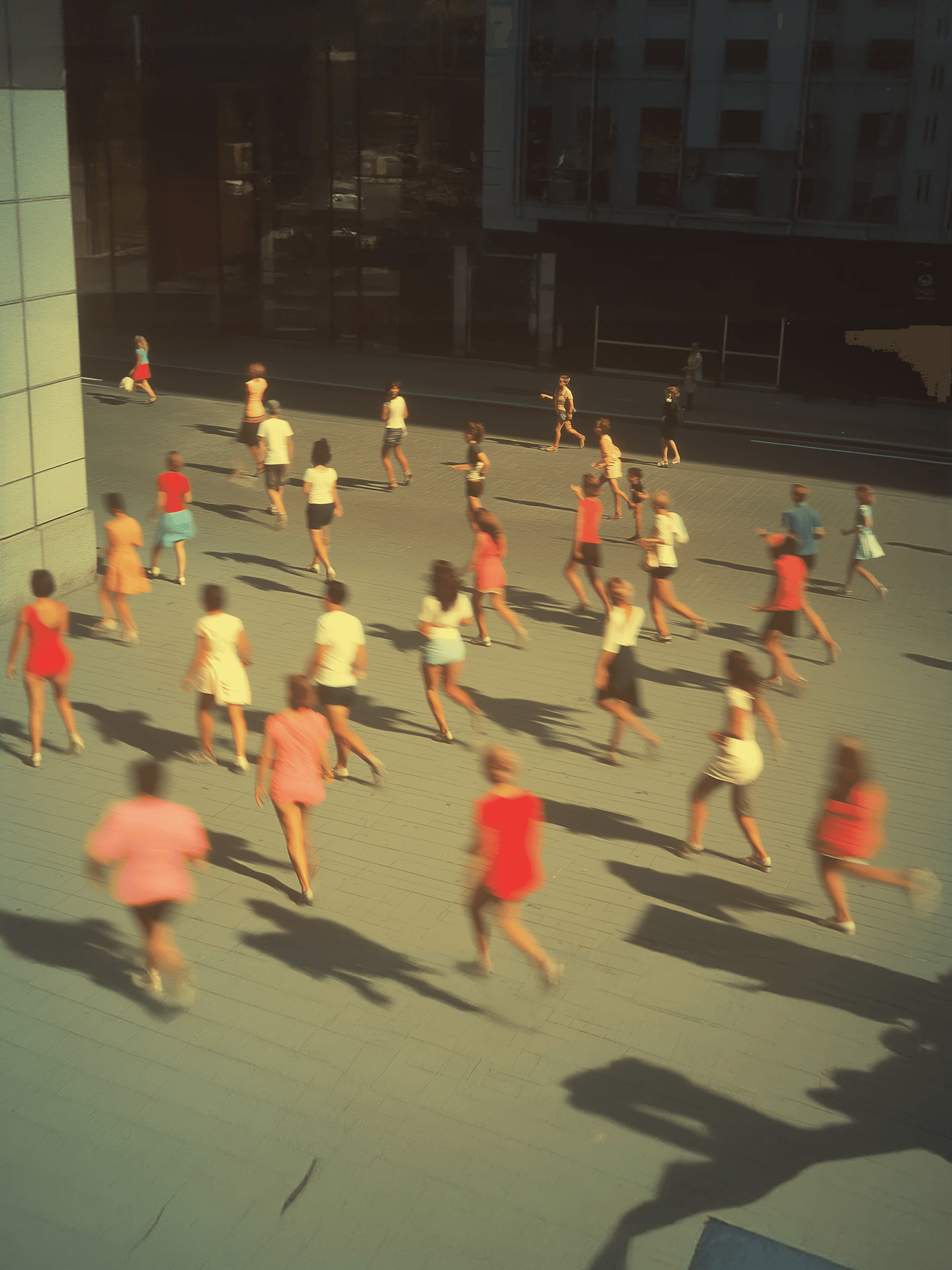 People moving through a busy public space